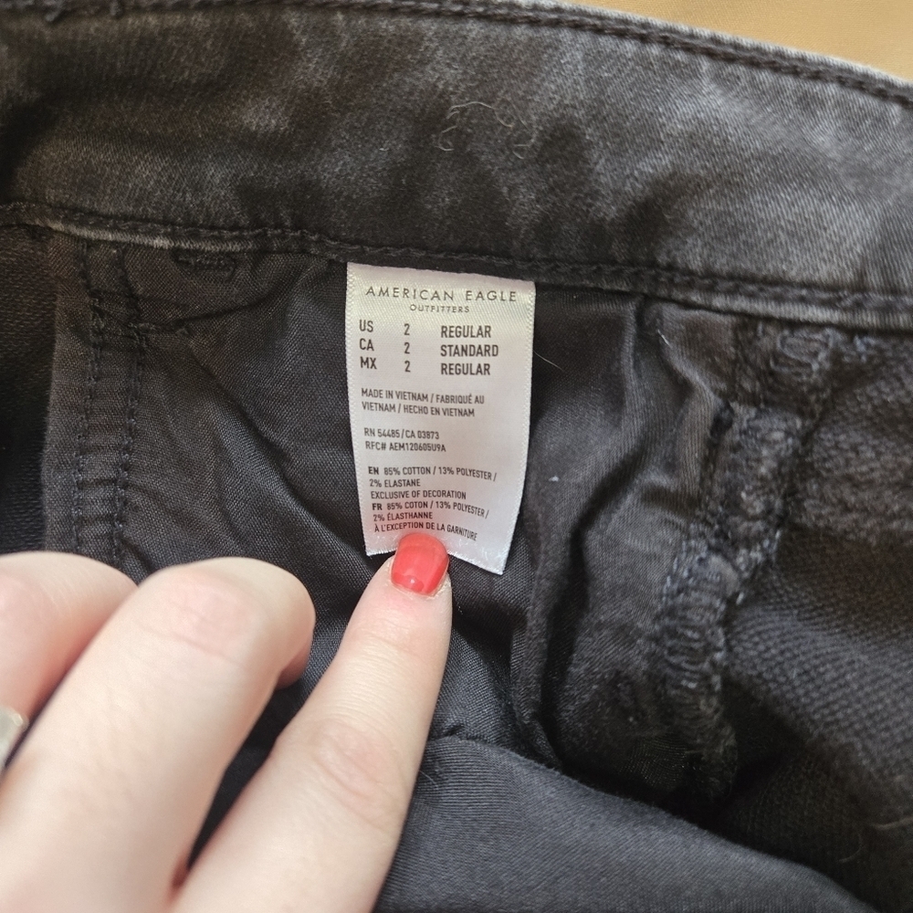 American Eagle Super High-Rise Heavily Distressed Black Skinny Jeans - Picture 3 of 7